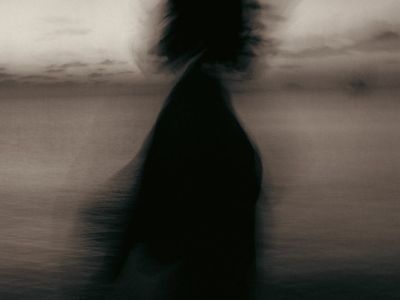 Abstract motion blur of a graceful arm movement.